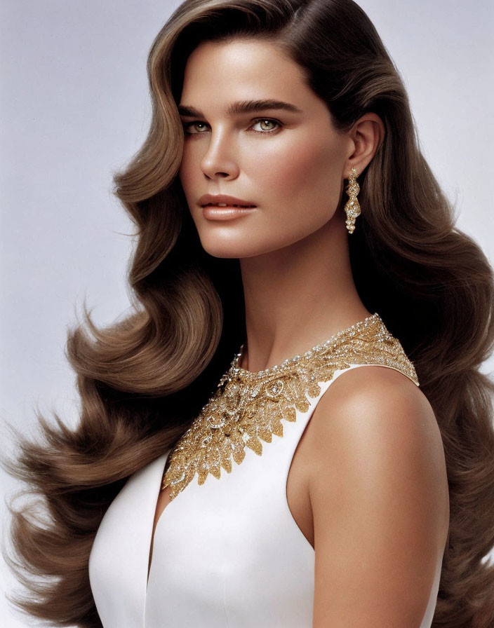 Woman with Voluminous Wavy Brown Hair and Green Eyes in White Outfit