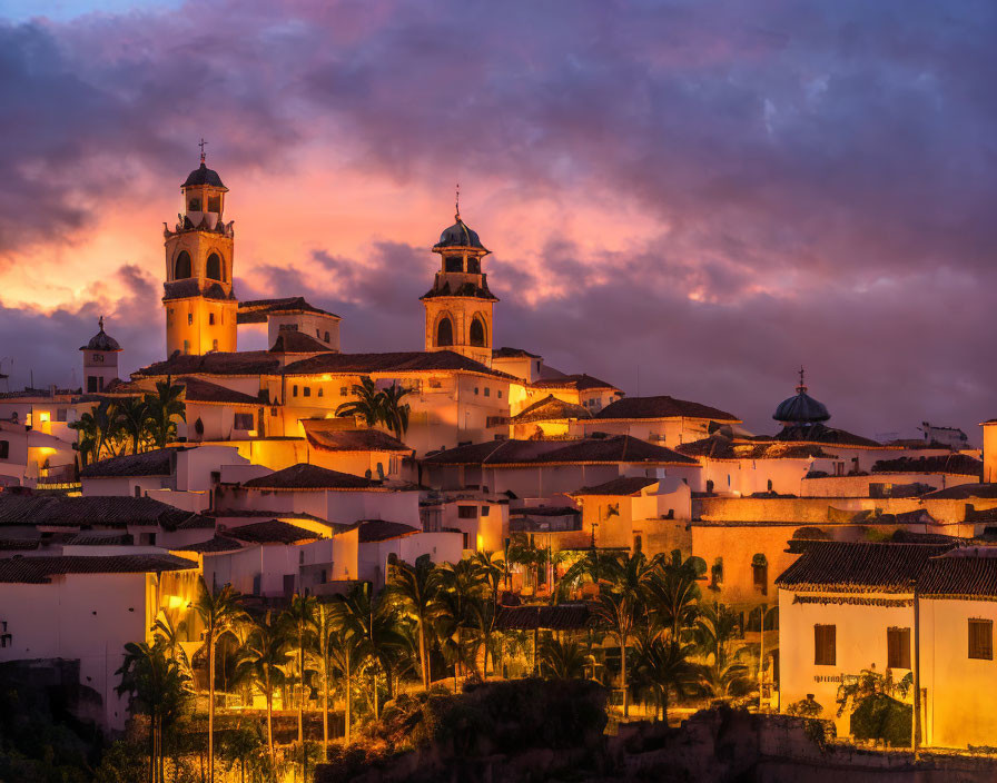 Dramatic Twilight Scene of Old Town with Lit Buildings and Church Towers