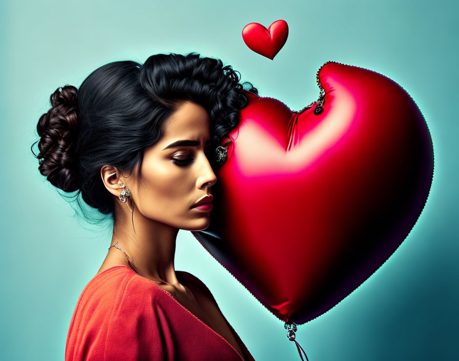 Elegant woman with hairstyle and red heart-shaped balloon on teal background