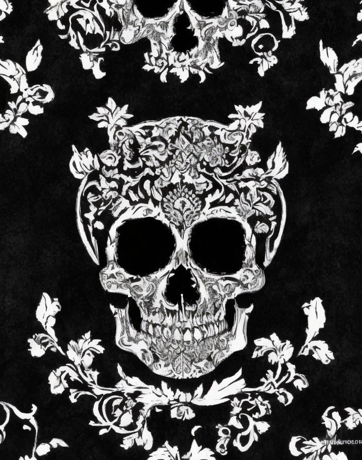 Monochrome floral pattern with skull centerpiece on dark background