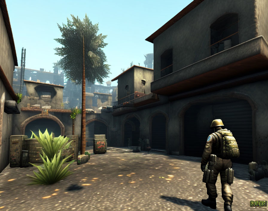 Deserted alley with soldier in camouflage gear and sandy buildings