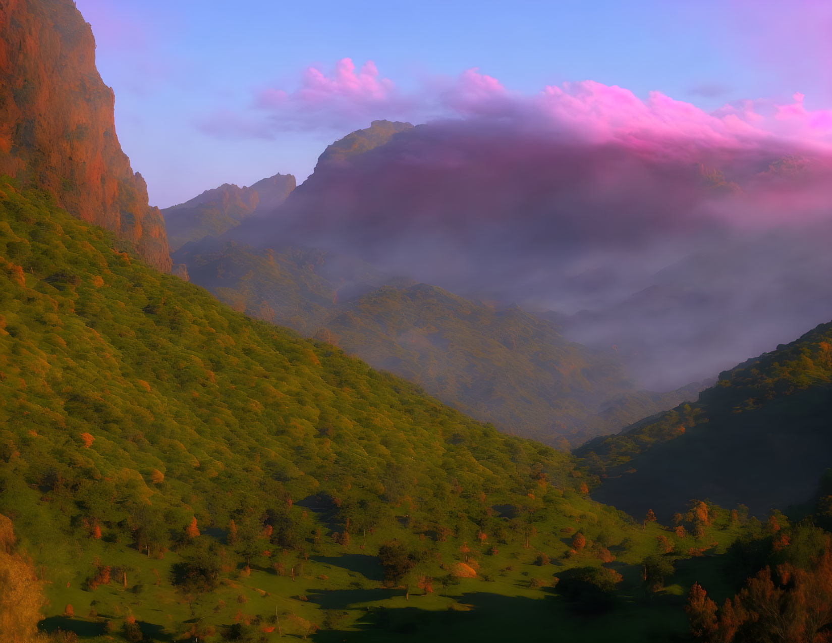 Mountain landscape at sunset with vibrant pink clouds and green forested slopes.