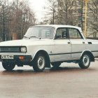 Classic Vintage Car with Front Lifted by Hydraulic Suspension in Sepia Tone