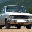 Vintage Silver Pickup Truck with Mountainous Background