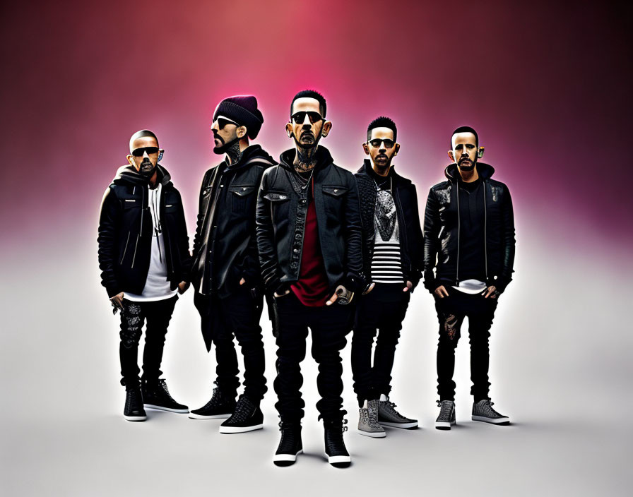 Five Men in Stylish Urban Attire Against Gradient Backdrop