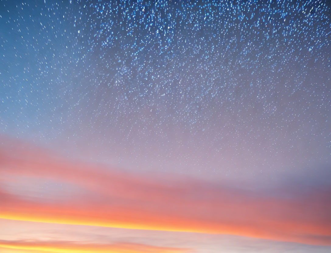 Gradient Twilight Sky: Warm Oranges to Cool Blues & Twinkling Stars