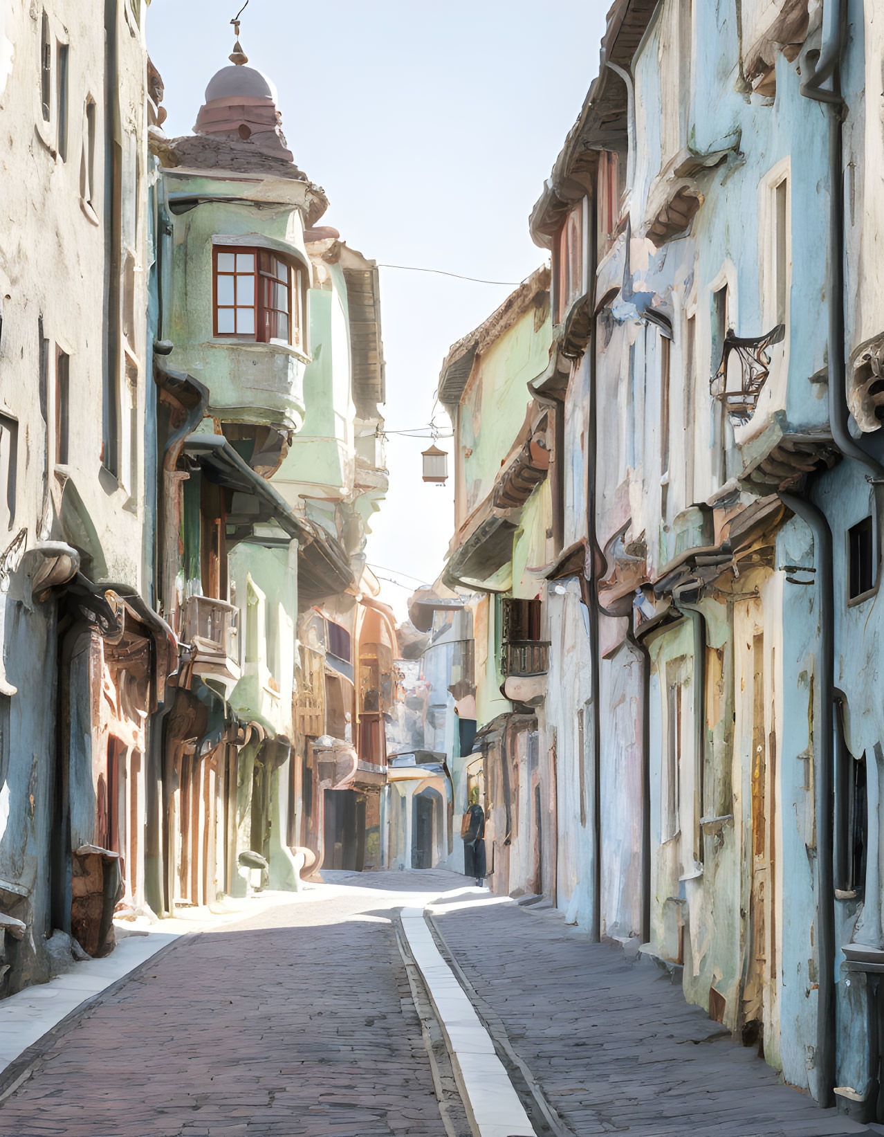 Colorful Cobblestone Street with Old Buildings and Dome