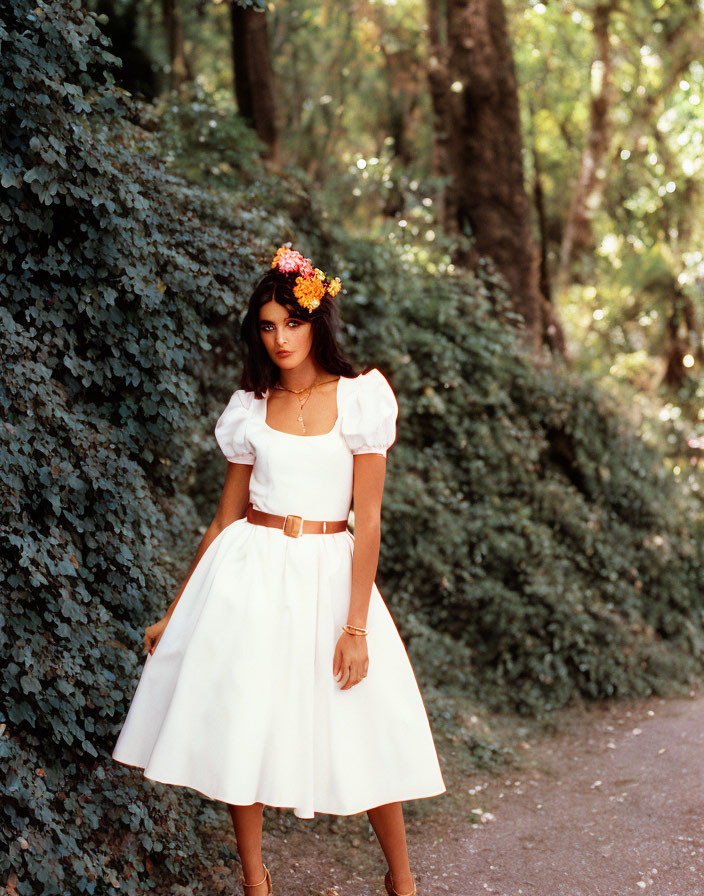 Woman in White Dress with Floral Headband on Forest Path