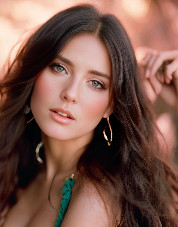 Portrait of Woman with Brown Hair and Green Eyes in Green Ruffled Outfit