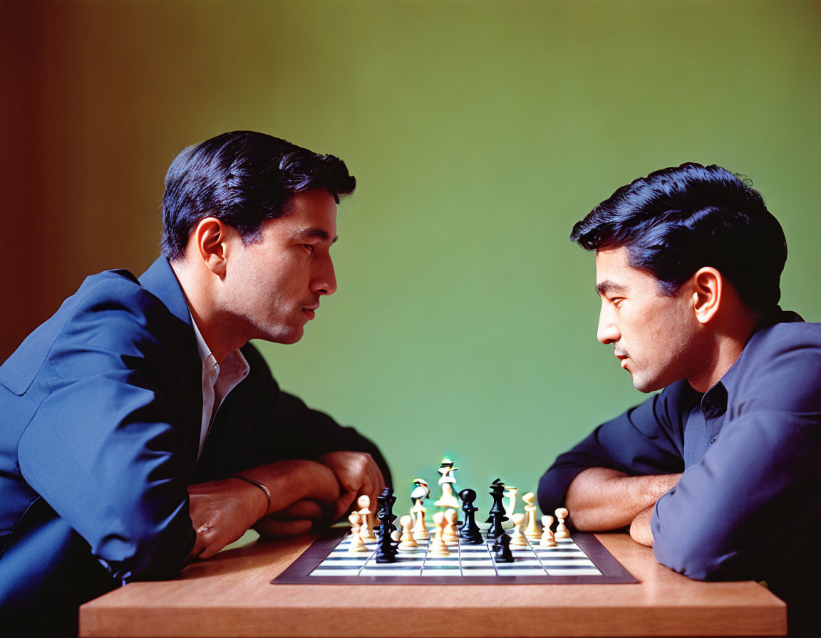 Two men playing chess at a table