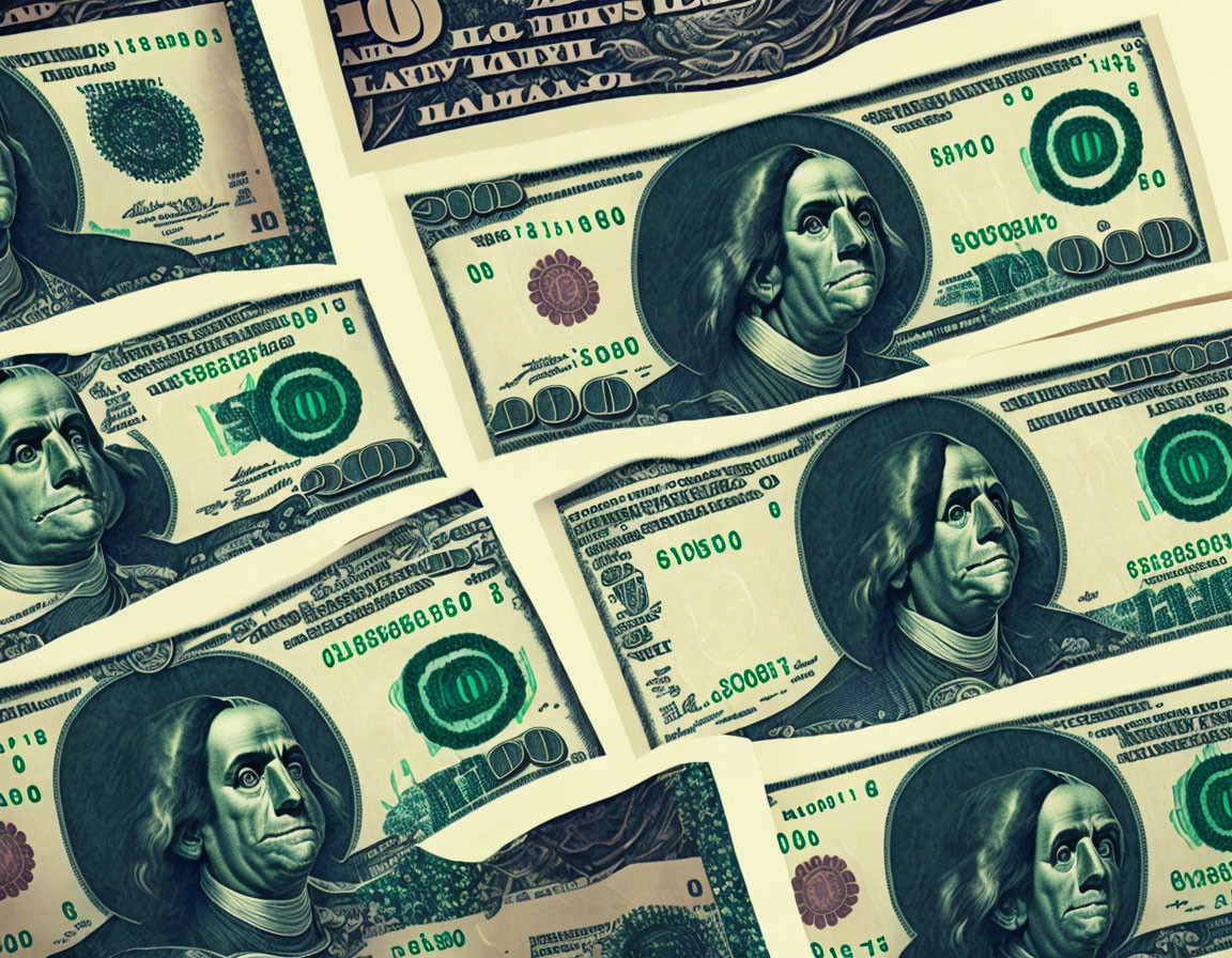 Scattered US 100-dollar bills with vintage Benjamin Franklin portrait.