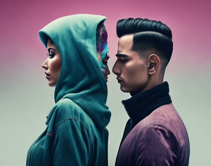 Stylishly dressed man and woman with unique hairdos on pink background