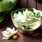 White Flowers and Gold Trim Bowl on Wooden Surface