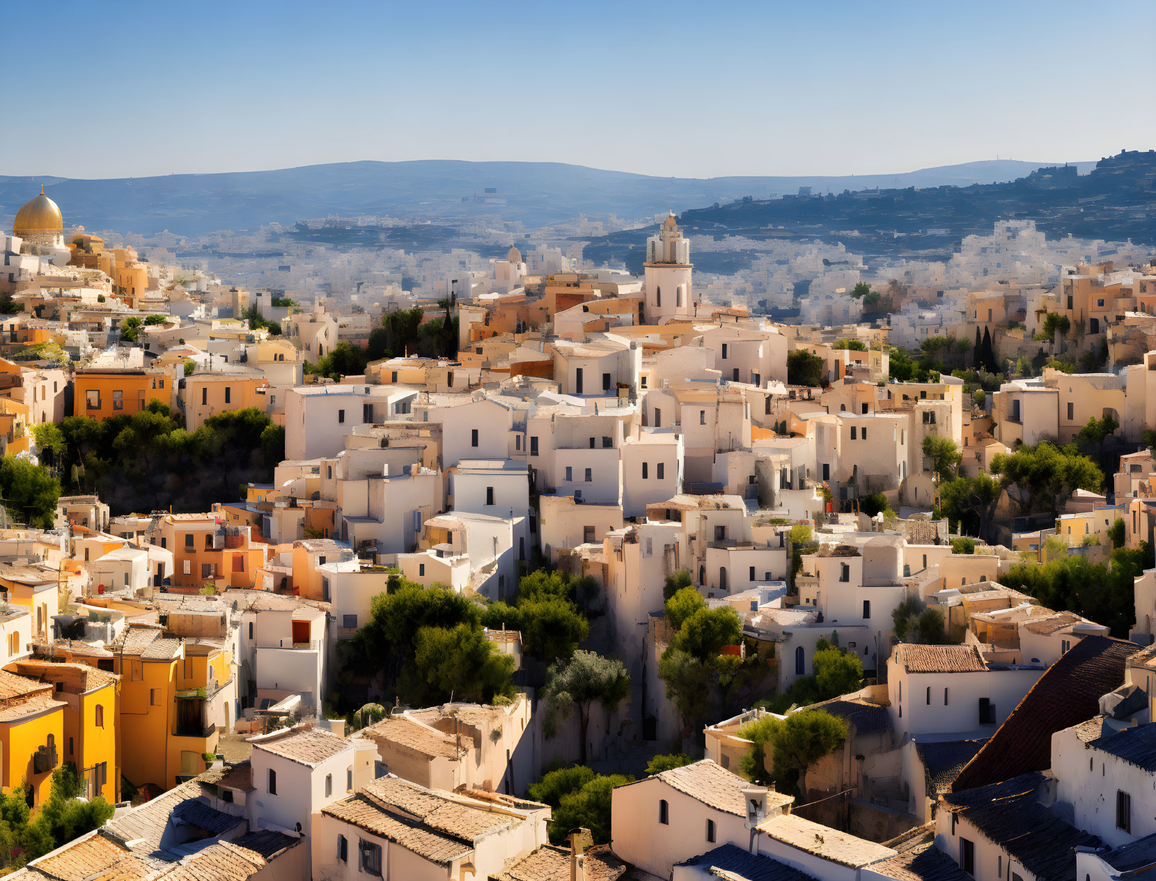 Scenic hillside town with white buildings and golden domes