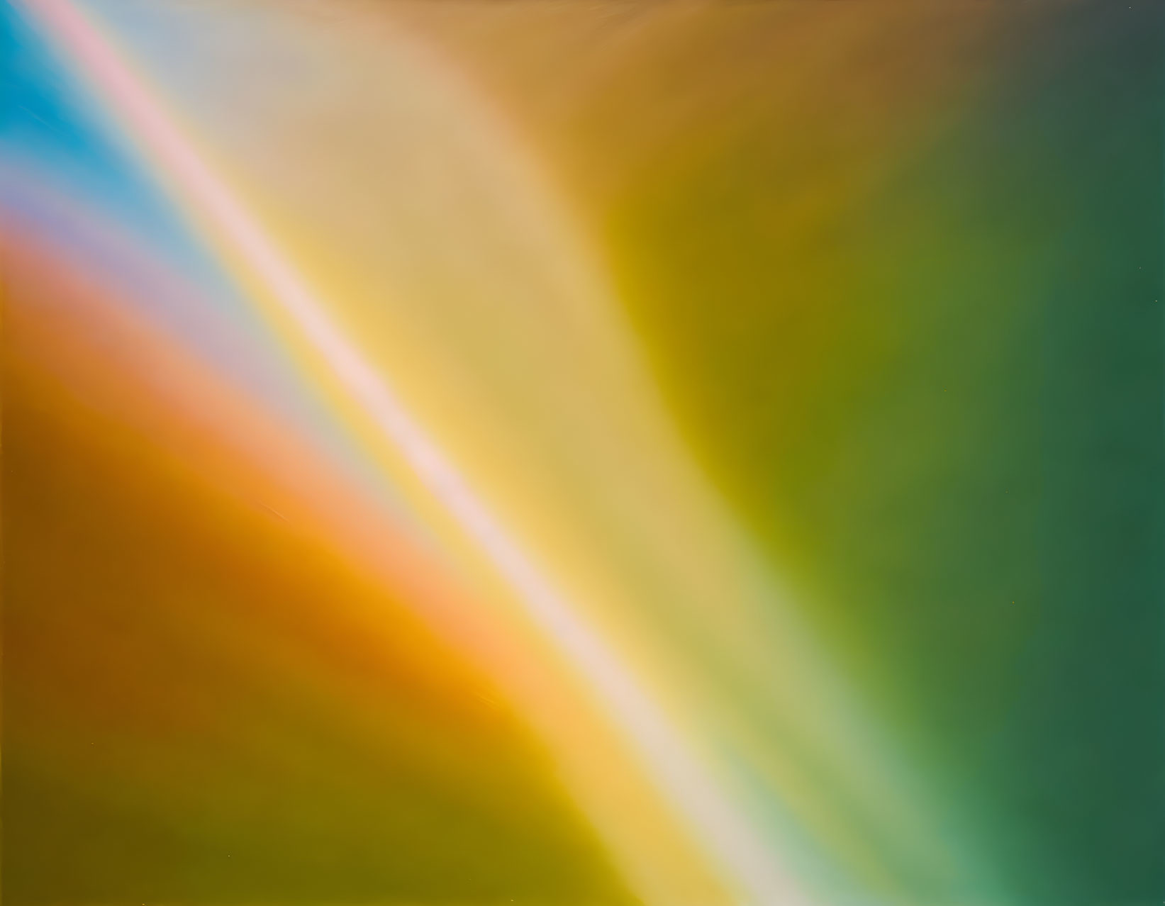 Abstract orange, yellow, and green gradient background.