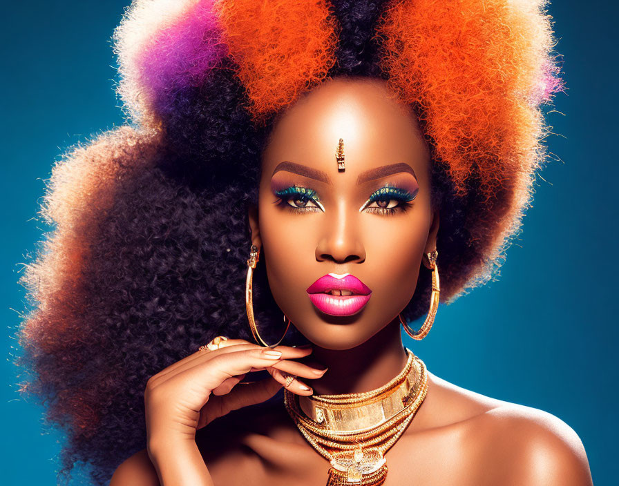 Colorful Afro Hair and Bold Makeup on Woman Against Blue Background