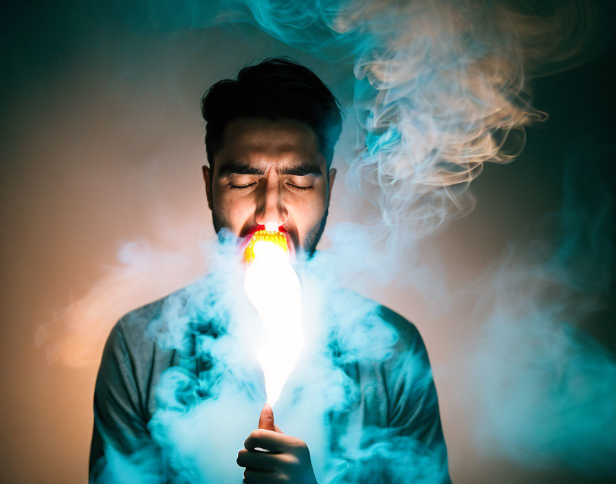 Man Breathing Fire with Closed Eyes on Dark Background