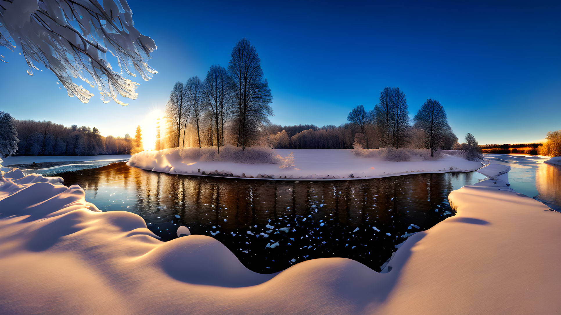 Snow-covered peninsula with river in winter landscape.