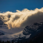 Snowy Peaks and Glacier in Dramatic Mountain Landscape