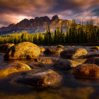 Tranquil river with moss-covered rocks, golden foliage, and majestic mountains at dusk