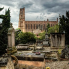 Colorful graveyard scene with ornate tombstones, bats, and lush vegetation