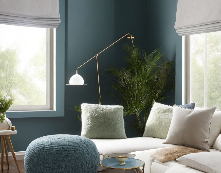 Cozy White Sofa with Teal Ottoman, Gold Lamp, Plants, Blue Walls