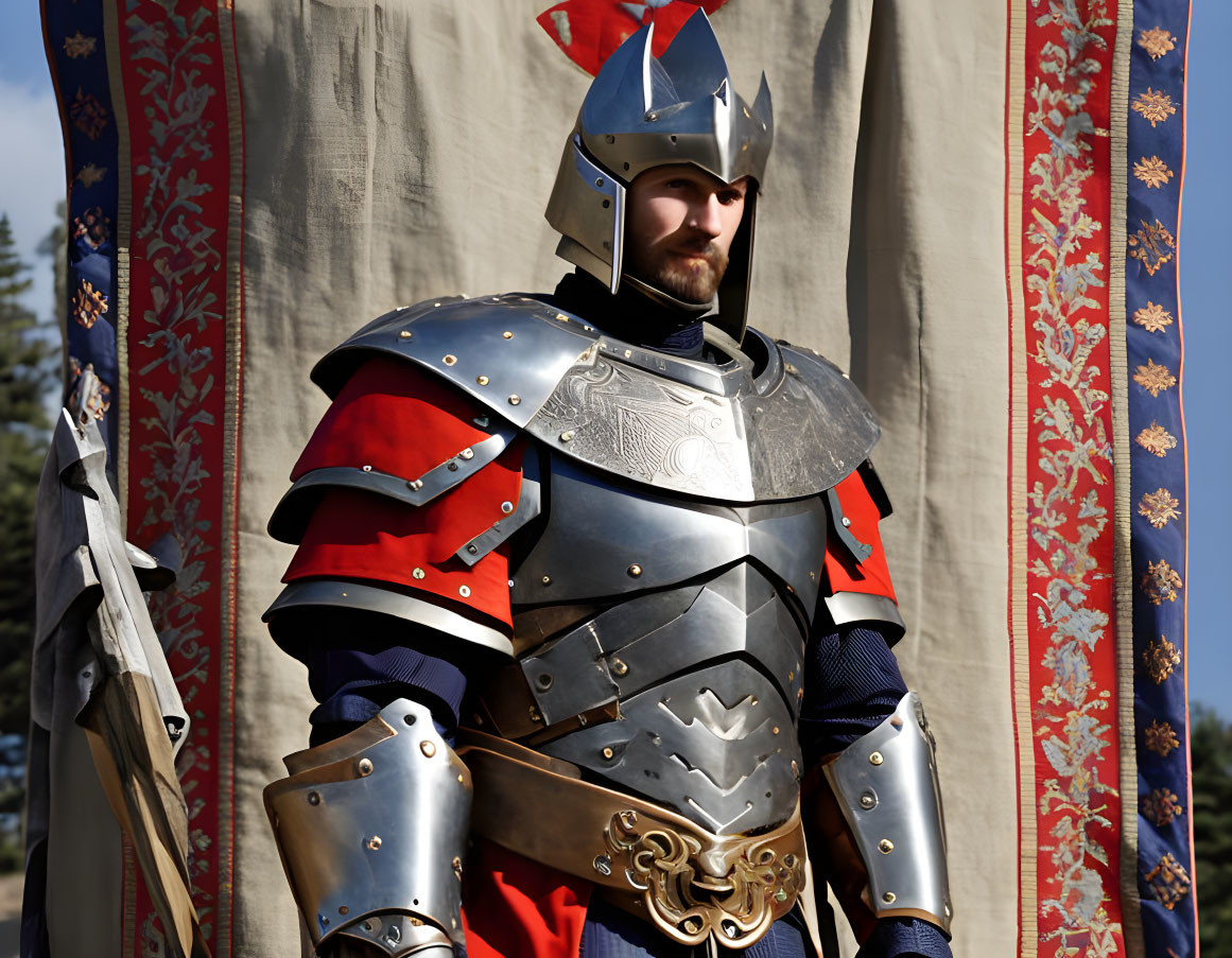 Medieval knight in silver helmet and red accents before decorative banner