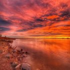 Tranquil Sunrise Landscape with Misty Lake Reflections