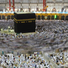 Aerial View of Kaaba at Mecca's Grand Mosque with Crowds and Architectural Details