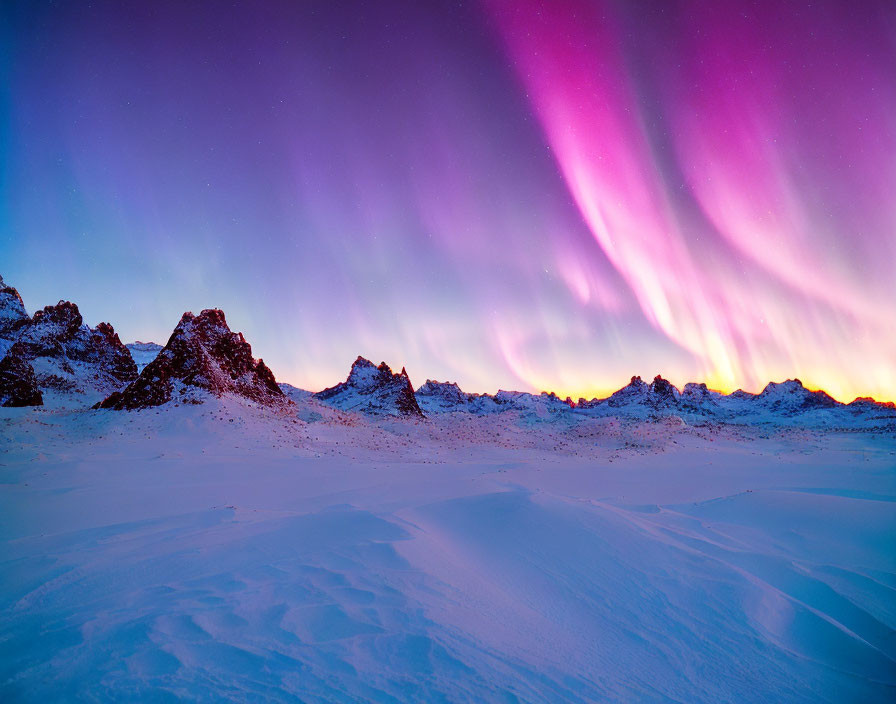 Colorful Aurora Borealis Over Snow-Covered Mountains