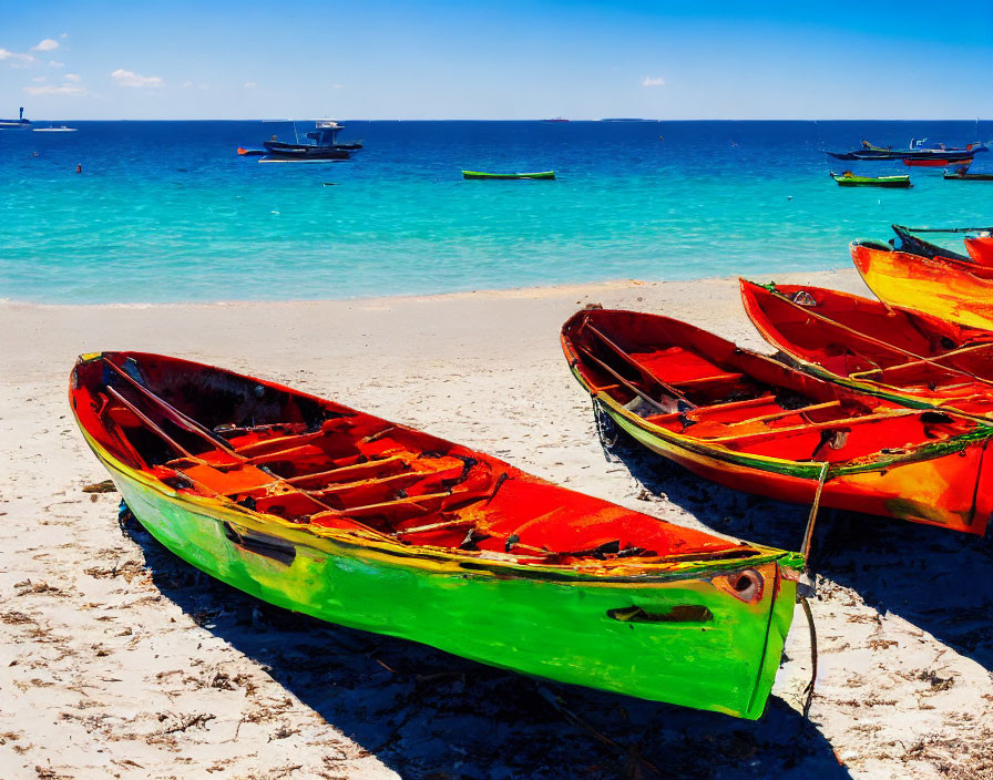 Vibrant boats on sandy beach with clear blue sea