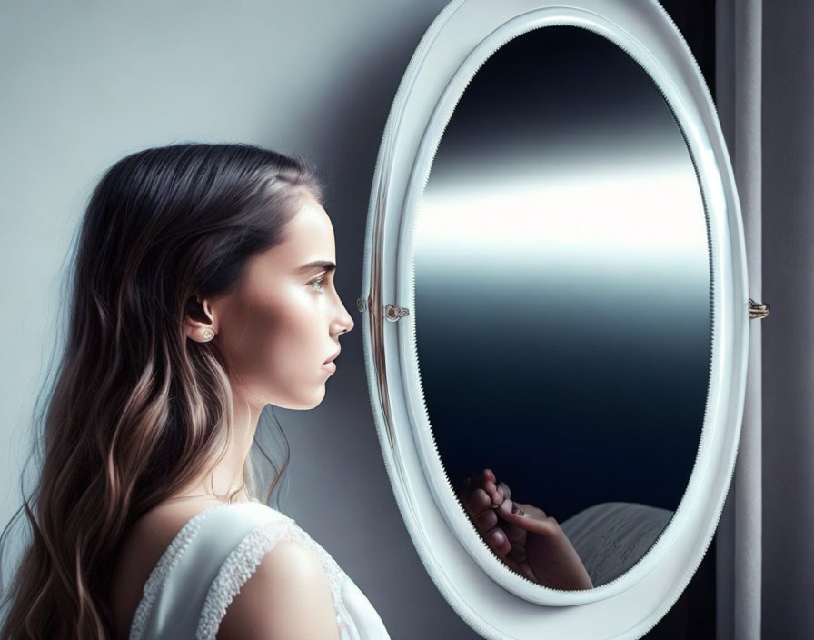 Profile of a Woman Reflected in Oval Mirror