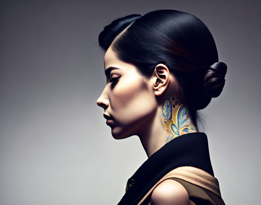 Woman with Sleek Hair and Large Earrings in Dark Outfit on Neutral Background