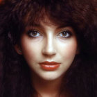 Portrait of Woman with Voluminous Curly Hair and Striking Eyes