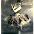 Graceful ballerina in gold tutu and pointe shoes in ornate room