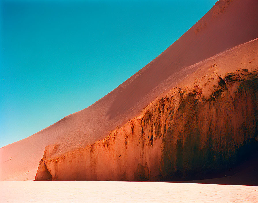 Vast Desert Landscape with Striking Red Sand Dune