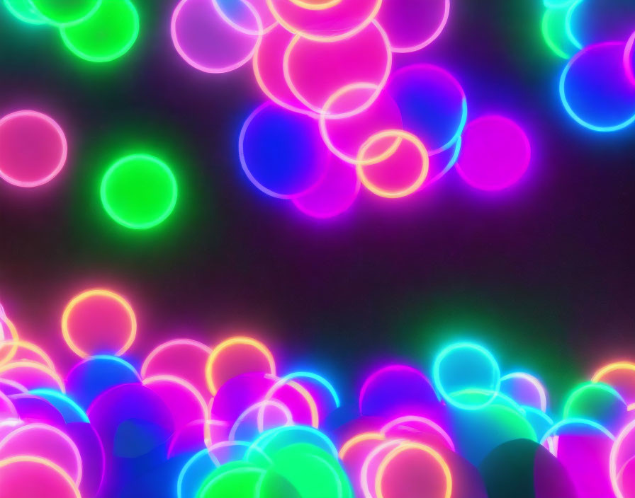 Colorful Neon Bubbles Overlapping on Dark Background