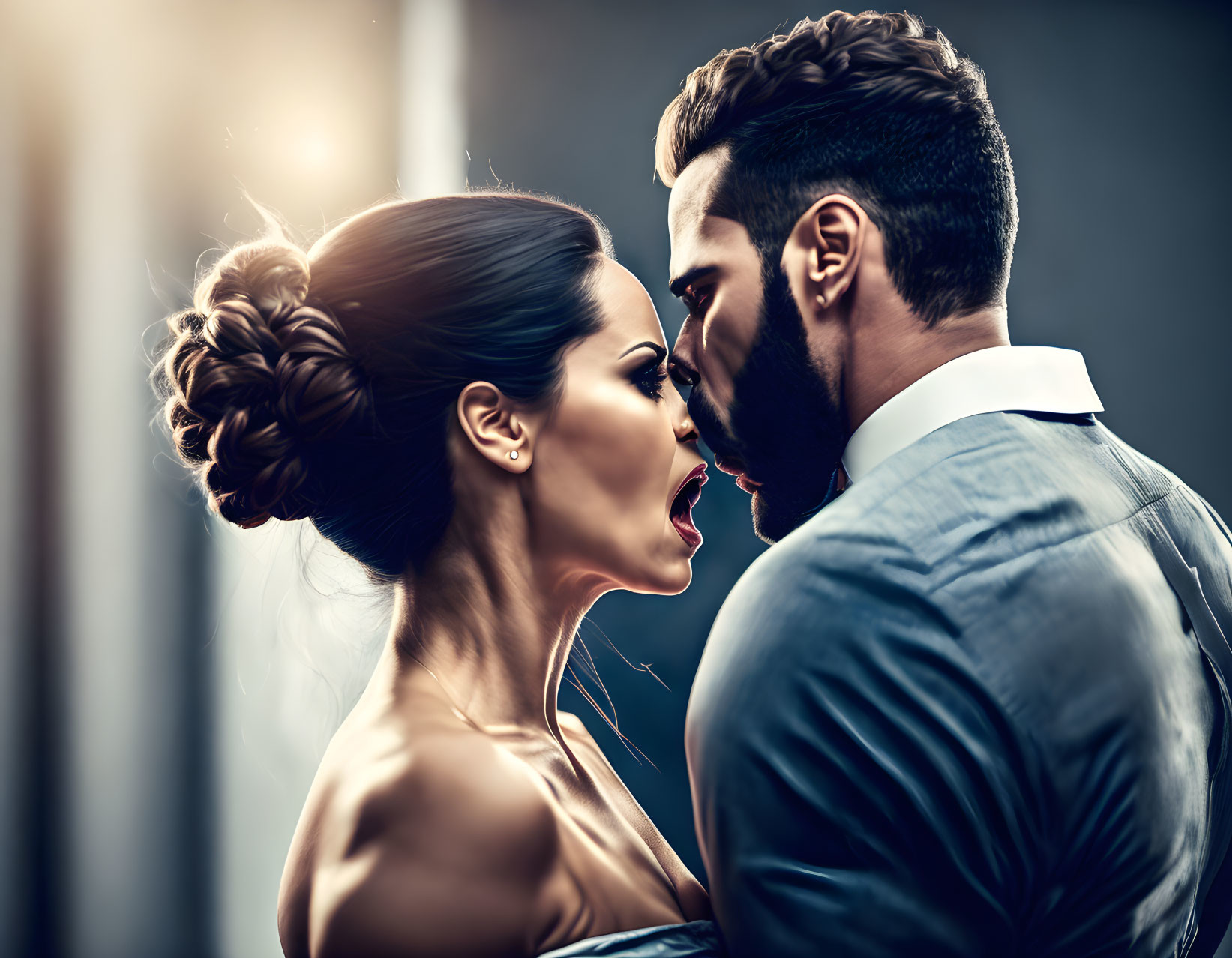 Romantic close-up image of man and woman in intense pose