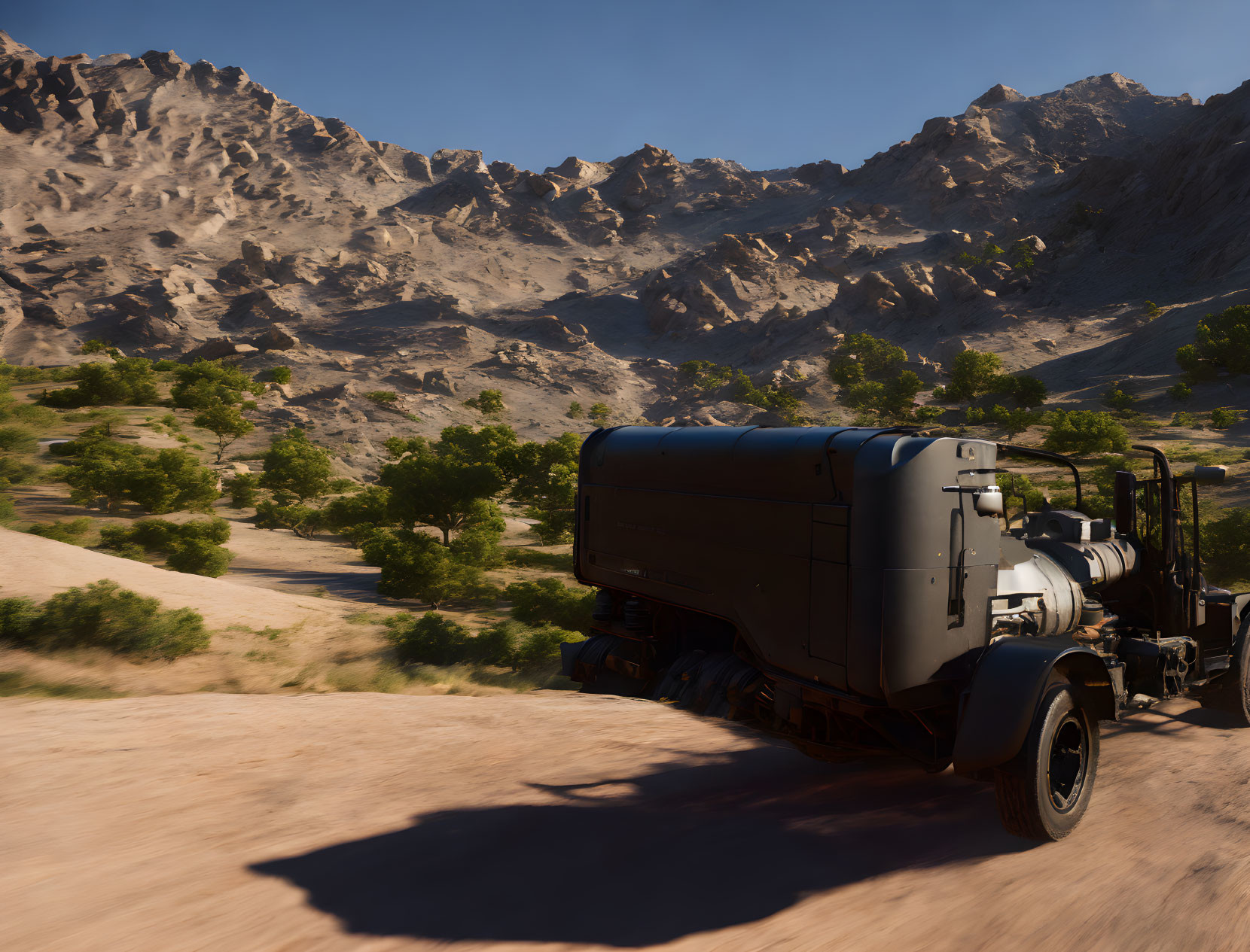 Military truck on dusty road with rugged mountains and clear sky