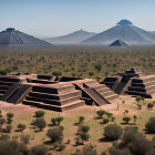 Expansive desert landscape with stylized pyramids and cacti under clear sky