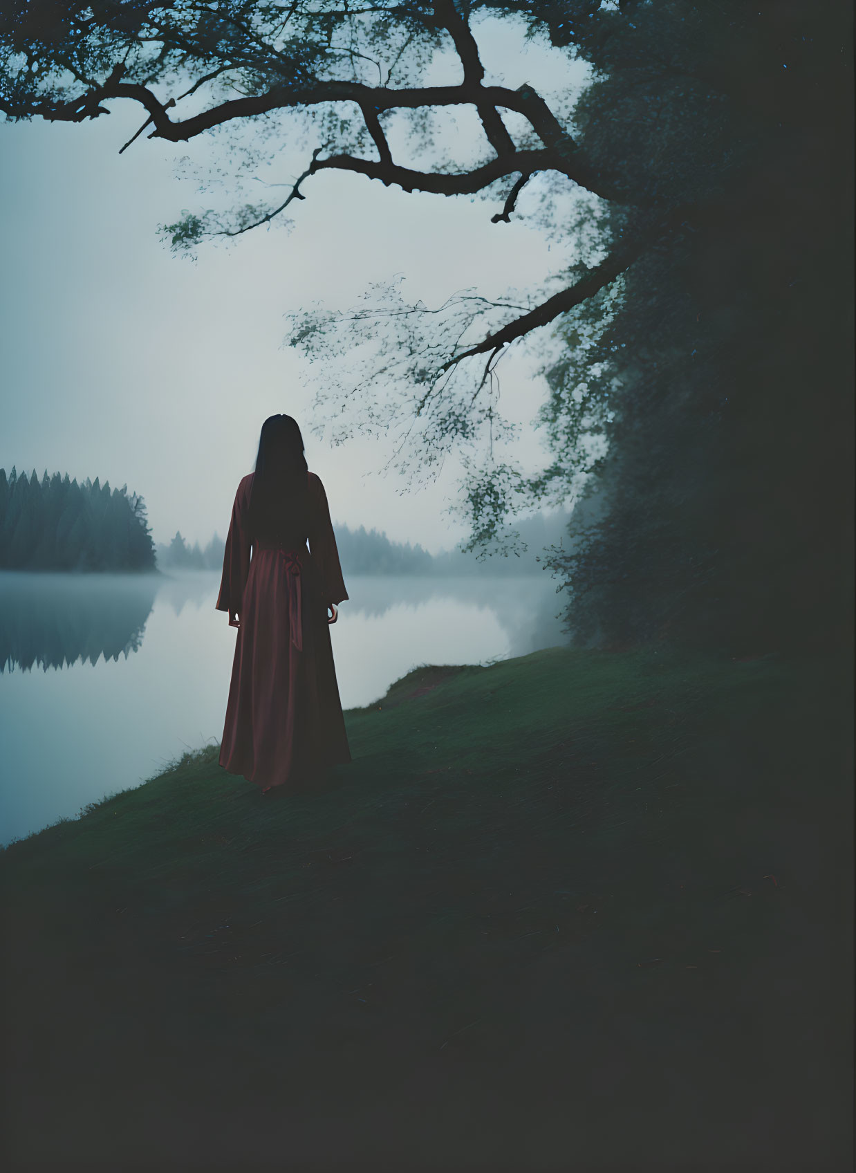 Person in Red Cloak by Serene Lake at Twilight