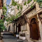 Colorful Traditional Mediterranean Village Alleyway with Hanging Plants