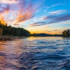 Colorful River Painting with Sunset Sky and Silhouetted Forests