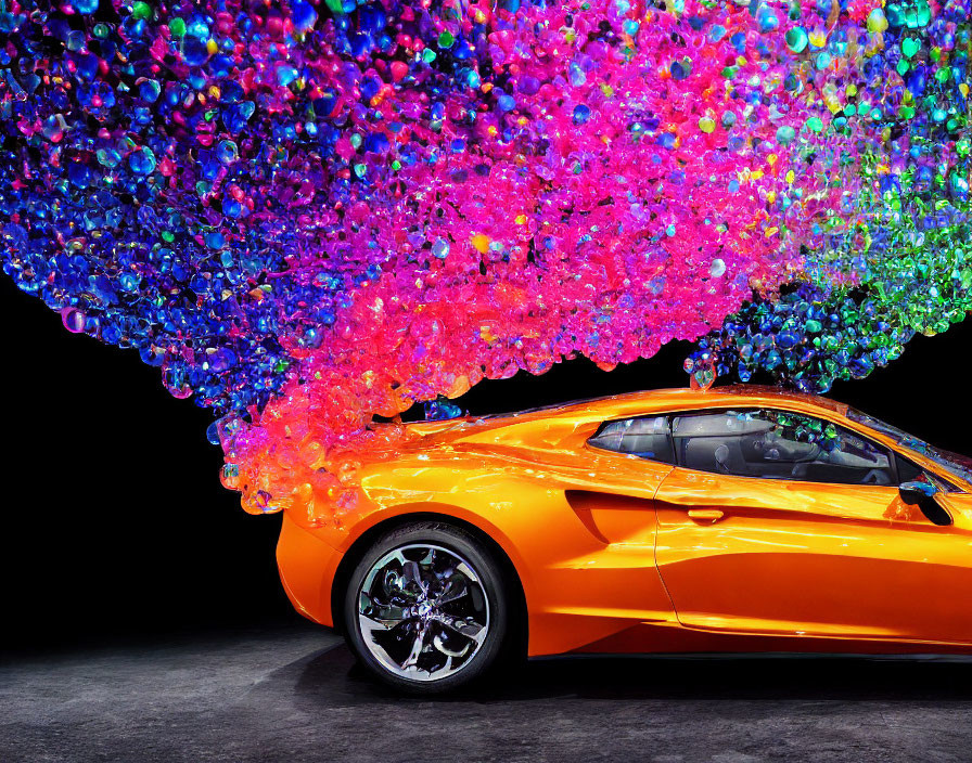 Bright Orange Sports Car with Colorful Bubbles on Black Background