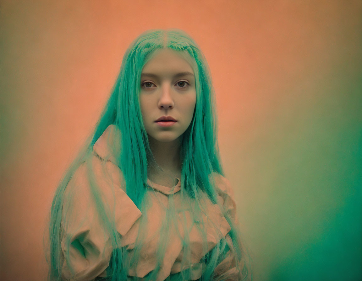 Turquoise-haired individual in sheer outfit on gradient background