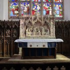 Intricate Baroque Altar with Carvings and Candlelight