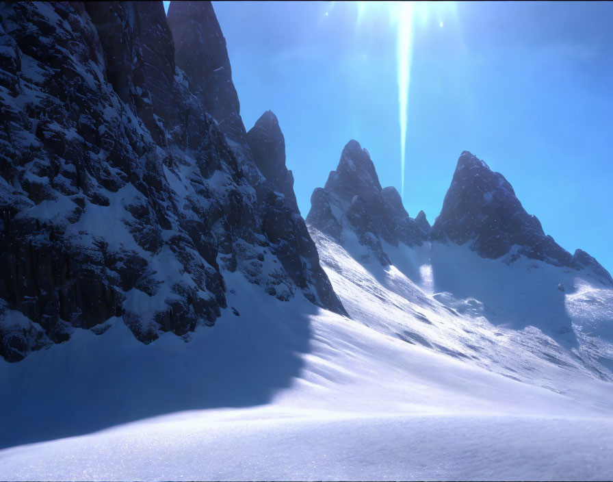 Snowy Mountain Landscape with Sharp Peaks and Clear Blue Sky