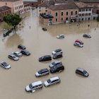 Flooded Town: Submerged Houses, Streets, and Vehicles