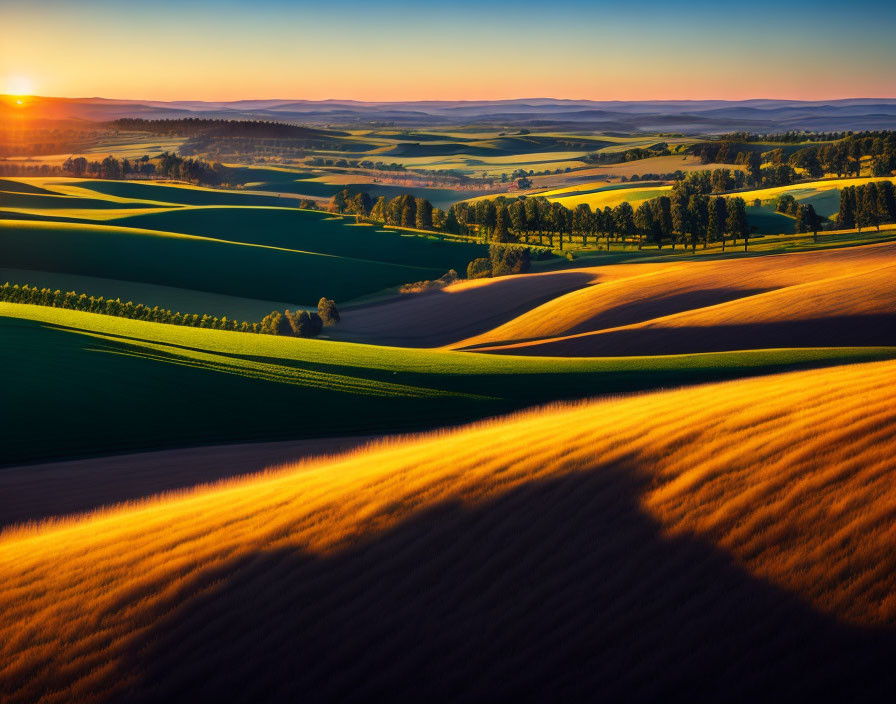 Picturesque sunset over rolling green and brown hills