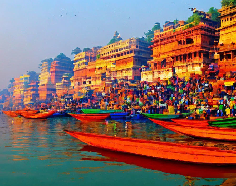 Vibrant boats on river by colorful buildings and people under hazy sky